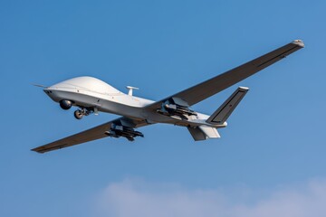 Obraz premium Military drone in flight against a clear sky