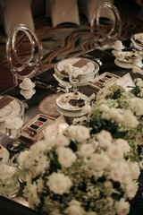 luxury wedding dining table and chair decoration with white roses