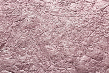 Texture of lilac crumpled paper, closeup