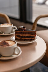Slice Of Chocolate Cake With Coffee