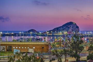 View of the Black Sea, Pier, Marina and Fortress at night and before dawn in Sile, Turkey. Seascape