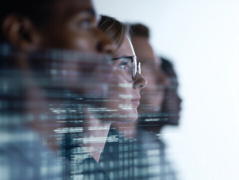 Diverse team focused on analyzing big data, technology innovation, and digital transformation in modern workspace