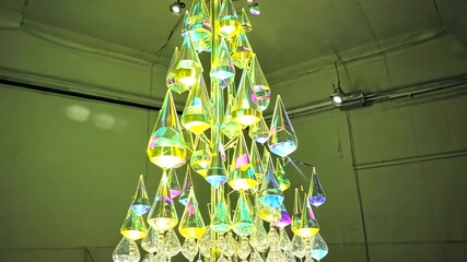 A stunning chandelier made of colorful crystal droplets illuminating a spacious gallery - Powered by Adobe