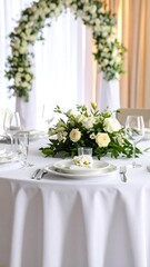 Elegant wedding table setting with floral centerpiece