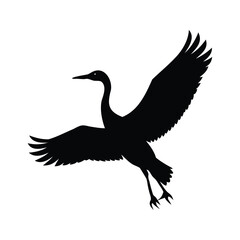 Dramatic silhouette of a crane in flight against a stark white background