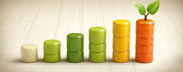 Growth concept with colorful stacked blocks and green leaves on top