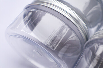 A Group of Bottles or Jars Packaging Mockup on an Isolated White Background