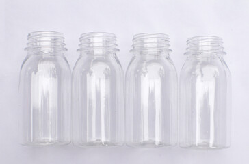 A Group of Bottles or Jars Packaging Mockup on an Isolated White Background