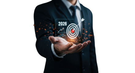 Businessman Presenting A Digital Target Symbolizing Goals And Future Planning Against Black Background
