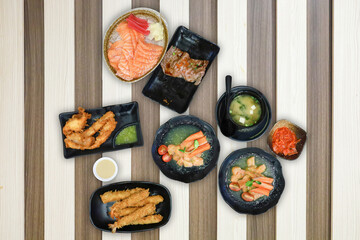 Top view of sushi, beef, and salmon fresh mixed, focus selective