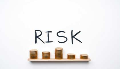Conceptual representation of risk in finance with coins stacked and bold lettering on a white background illustrating economic challenges and opportunities