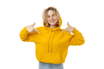 Happy woman in yellow hoodie points at herself, isolated on white, PNG