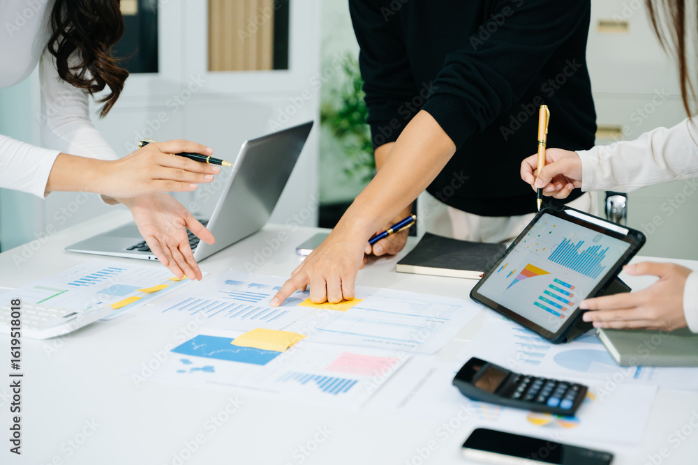 Poster business documents on office table with smart phone and calculator digital tablet and graph business