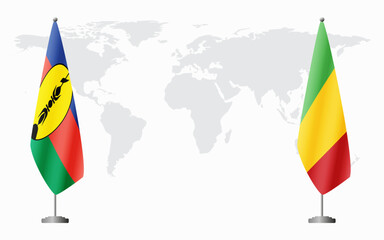 New Caledonia and Mali flags for official meeting against background of world map.