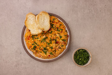Menemen is Turkish Breakfast, Eggs With Peppers And Tomatoes Or Turkish Egg Scramble. 