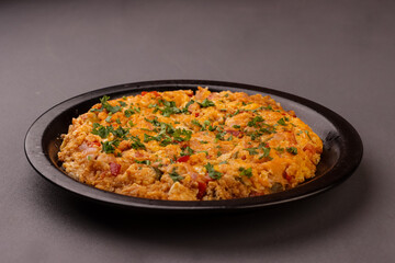 Menemen is Turkish Breakfast, Eggs With Peppers And Tomatoes Or Turkish Egg Scramble. 