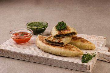 Zhingyalov Hats or Jingalov Hats is Armenian Herb Stuffed Flatbread From The Republic Of Artsakh.