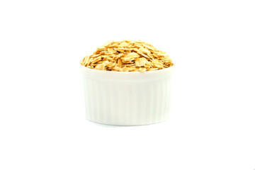 Oatmeal in a bowl on a white background. Oatmeal in a cup. Contains antioxidants, which can help reduce the risk of high blood pressure.