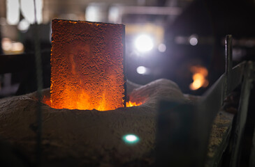 Foundry - ferrous metal is melted in an induction furnace of metallurgical plant