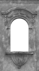 facade of Old vintage arched windows glowing with white curtains inside. Belgrade Serbia Old Town, city center. detail of window framed with stone carvings patterns. classical decorative White mockup