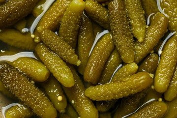 Texture of tasty pickled cucumbers as background
