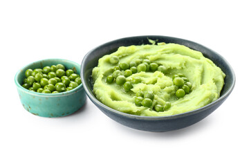 Bowl with mashed green peas on white background