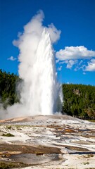 Geyser erupting into a vivid blue sky