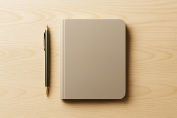 Minimalist beige notebook and pen on light wooden background for branding or design mockup concept with clean copyspace.