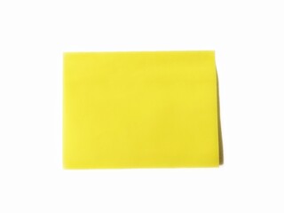Blank yellow sticky note isolated on white background with clipping path. Sticky note paper with shadow. Yellow note paper looks vintage with wavy edge texture.