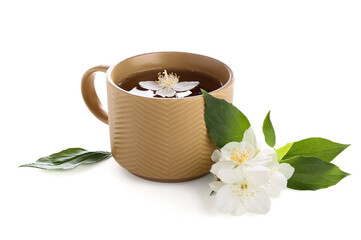Cup of hot jasmine tea with flowers on white background