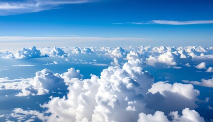 High-altitude view of fluffy clouds and a vibrant blue sky (2)