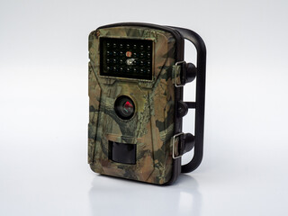 Trail camera isolated on white background. Wildlife monitoring. Camera with night vision and motion sensor