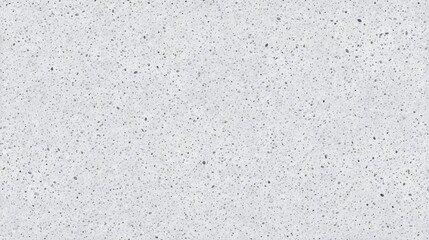 Obraz premium Gray speckled texture creates a rough stone like surface, ideal for backgrounds in various graphic designs.