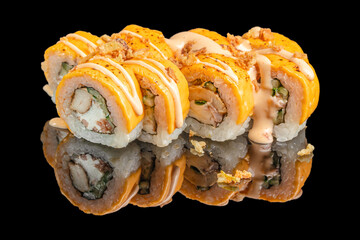 Delicious sushi rolls filled with chicken, cream cheese, and vegetables are topped with bright...