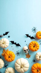 Halloween themed flat lay on light blue background