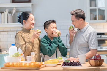 Warm moment at home, together, parenting, greeting, happiness, Christmas greeting season lifestyle tradition, joyful scene of child and grandparents sharing time in kitchen, New Year holiday festive