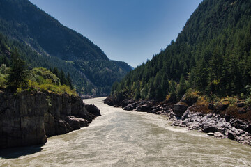 A view of the muddy Fraser River around Hell's Gate.      BC Canada
