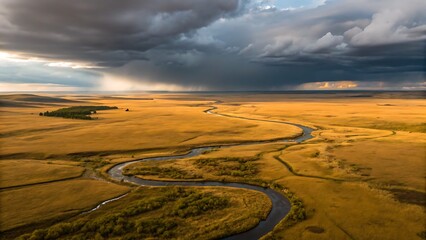 Fototapeta premium aerial view winding river on savannah