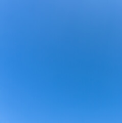 Low angle view and full frame of beautiful light blue sky without clouds in the afternoon on sunny day used as natural background texture in decorative art work