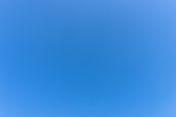 Low angle view and full frame of beautiful light blue sky without clouds in the afternoon on sunny day used as natural background texture in decorative art work