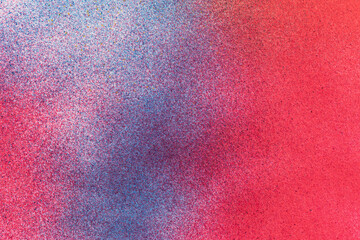 赤色と青色のスプレー塗料で塗った背景