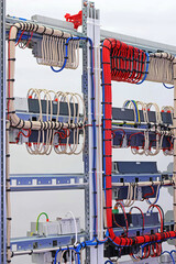 View from the back of the electrical panel. Connection of electronic modules using copper...