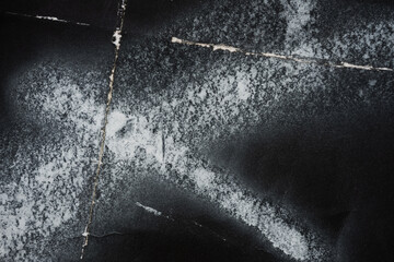 black folded paper texture background
