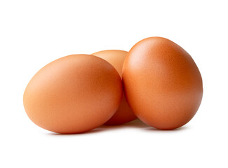 Three brown chicken eggs in stack isolated on white background with clipping path