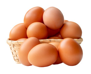 Many brown chicken eggs in stack in wicker basket isolated with clipping path in png file format