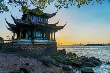 Fototapeta premium The beautiful natural scenery of the Yangtze River and the ancient riverside architecture in Jiangyin, Jiangsu Province, China, on July 20, 2025