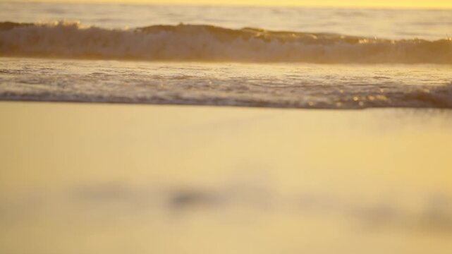 Close up of waves rising with the tide