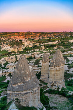 Cappadocia Rocket valley fairy chimneys glowing at sunset in Turkey