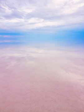 Drone capturing aerial view of pink Tuz Lake in Turkey