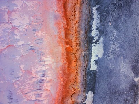 Aerial view of colorful abstract pattern of Tuz Salt Lake in Turkey